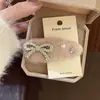 Pinza para el pelo de felpa con lazo de perlas suave estilo coreano Pinza BB Nueva Dulce Moda Celebridad de Internet Pinza lateral para flequillo para mujer