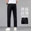Jeans cropped negros de seda helada que no se decoloran para hombre, verano 2026, pantalones casuales rectos elásticos finos de corte ajustado