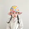 Sombrero de pescador para bebé al por mayor moda estampado pequeño fresco sombrero para el sol dos lados disponibles sombrero para niños versión coreana
