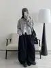 Elegante suéter de punto, suave pero bien estructurado, un cárdigan corto cómodo para otoño e invierno