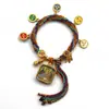 Pulsera de cinco vías del dios de la riqueza estilo Tíbet ocho santos protectores cinco maestros Manjushri dios de la riqueza amarillo thangka cuerda tejida a mano pulsera del año de esta vida