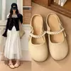 Sandalias casuales para mujer sin cordones para el verano, nuevo estilo versátil con adornos de perlas, zapatos perezosos de suela plana 2026