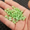 Cuentas sueltas para joyería obsidiana sintética cuentas de arroz sueltas jade Hetian sintético fila ovalada cuentas sueltas cuentas de arroz verdes accesorios rojos cuentas