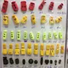 Según la muestra de color hebilla de cuerda al por mayor y al por menor plástico chapado reloj de péndulo hebilla de cuerda de color ABS hebilla de resorte hebilla de ojo de gato