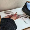 Óculos de sol oval sem aro, moda europeia e americana, para mulheres, proteção UV, design de nó moderno, óculos de sol estilosos de alta qualidade para proteção solar para homens