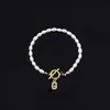 Pulsera de Moda de Venta Caliente Transfronteriza 2026 con Diamantes y 26 Letras, Pulsera de Perlas de Imitación Ovaladas, Disponible para Venta al por Mayor para Mujeres
