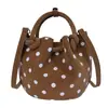 Bolso de mano retro de lunares de estilo coreano para mujer, nuevo bolso cruzado casual de otoño 2026, popular bolso tote tipo cubo