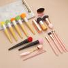 Mini brocha de maquillaje transfronteriza en stock brocha de maquillaje mango de madera brocha para polvo herramientas profesionales de belleza traje de brocha de maquillaje
