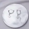 Brincos de Pérola Coreanos de Alta Qualidade 2026, Agulha de Prata Estilo Vintage Chanel Diamante Colorido Estrela de Oito Pontas Brincos de Tarraxa Atacado
