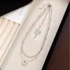 Collar de Perlas Geométricas Florales de Doble Capa, Suave y Sencillo, Estilo Coreano, Accesorios para Mujer, Cadena para Suéter con un Toque de Lujo Ligero y de Alta Gama