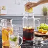 Jarra de vidrio de 2 litros 68 oz con tapa y boquilla con asa para refrigerador hervidor bebida caliente/bebida fría botella de agua de vidrio té helado