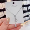 Colar de Cabideira Pequena com Pingente Vazado de Franja de Strass Temperamento Feminino Celebridade da Internet Design Simples Senso de Design Corrente para Clavícula de Celebridade da Internet