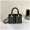 Bolso de mujer exquisito súper popular estilo coreano 2026 nuevo diseño de moda bolso cruzado versátil bolso de mano tejido de nicho bolso tote pequeño