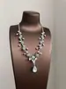 Collar transfronterizo europeo y americano de cuentas y piedras, multicapa con diamantes brillantes, cadena para la clavícula de borla de perlas, a la moda y de alta gama