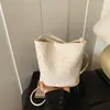Bolso cubo de moda transfronterizo para mujer, nuevo modelo primavera 2026, bolso de hombro de nicho de alta gama, bolso cruzado versátil