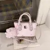 Bolso Cubo Estilo Japonés y Coreano con Estampado de Dibujos Animados para Mujer 2026 Nueva Moda Bolso de Hombro Cruzado Versátil para Viajes Casuales