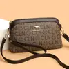 Bolso de mujer transfronterizo retro europeo y americano de lujo ligero tacto de alta gama con estampado bolso para madre moda para mujeres de mediana edad bolso de hombro único bandolera moderno