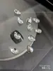 Joyería de Pedrería K9 de Alta Calidad con Parte Trasera Puntiaguda para Uñas, Pedrería Transparente Blanca tipo Caramelo de Roca Deslumbrante, Pedrería Irregular Apilada en Ángulo Recto Largo, Bolas de Pedrería para Uñas al por Mayor