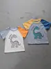 Camiseta de Verano para Niños Estilo Coreano de Manga Corta con Estampado de Dinosaurio para Niños y Niñas, Camisa de Cuello Redondo para Niños Pequeños y Medianos, Tops de Exterior para Niños