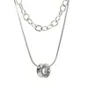 Moderna Cadena para Clavícula con Anillo de Acero Inoxidable Cadena Europea y Americana Simple Hip-Hop Colgante Redondo de Doble Capa Collar en Capas para Mujeres con un Toque de Alta Gama