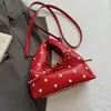 Bolso de lunares de nicho de moda para mujer, nuevo bolso cruzado de moda primavera 2026, bolso de mano pequeño exquisito
