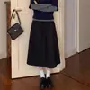 Falda midi gruesa de color gris oscuro con estampado floral para mujer, nueva colección otoño 2026, con cintura elástica, diseñada para estilizar la figura y crear un efecto adelgazante