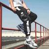 Calças Cock de Lã Sarjada de Poliéster Masculinas Estilo Coreano Fashion Calças Comprimento Tornozelo Calças de Perna Pequena Perna Larga Calças Casuais para Homens