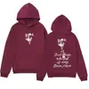 Sudadera con capucha de diseño de marca de moda con estampado de letras y cabeza de lobo es simple y versátil