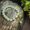 Juego de collar y pulsera de jade de diez yuanes al por mayor Suministro de puesto de jade estudio para enviar cadena flotante para madre para colgar del cuello