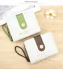 Carteira curta feminina novo estilo, carteira simples estilo japonês, carteira dobrável para estudante, porta-moedas fofo de nicho com múltiplos porta-cartões