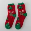 Calcetines de Navidad de coral de otoño e invierno, calcetines de suelo cálidos para el hogar de terciopelo medio, calcetines de Navidad de Papá Noel