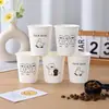 Taza de Papel Ins de Dibujos Animados Desechable para Agua Engrosada de Grado Alimenticio para el Hogar Anti-quemaduras Taza para Bebidas Calientes y Frías Caja Completa de 500 Piezas Venta al por Mayor