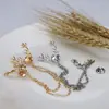 Xz0116 Moda Europea y Americana Broche de Astas Cadena Borla Broche Cabeza de Ciervo Pin de Solapa Accesorios para Ropa