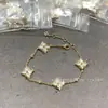 Marca de Luxo High-End Pulseira de Trevo de Quatro Folhas Redondo em Forma de Diamante, Flor de Quatro Pétalas, Flor de Cinco Pétalas para Mulheres, Madrepérola Branca, Madrepérola Rosa, Modelo Popular, Vendas Diretas por Transmissão ao Vivo