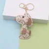 Pingente de Bolsa Fofo de Cachorrinho Snoopy Celebridade da Internet, Chaveiro de Carro Feminino, Ornamento Feito à Mão, Presente para Casal Venda por Atacado