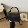 Bolso de mano elegante de color sólido de alta gama para mujer 2026 temporada actual nueva moda versátil ins de un solo hombro bandolera bolsa cuadrada pequeña