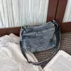 Bolsa Jeans para Mulheres 2026 Nova Tendência Super Popular Bolsa de Ombro para Aula e Deslocamento Bolsa Tote Transversal de Grande Capacidade