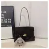 Bolso de hombro de gamuza para mujer, bolso Kelly de nicho, bolso cruzado retro versátil popular, bolso de axila de moda para el día a día