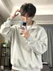 Sudadera para hombre de media cremallera con cuello alto, color liso, corte holgado, top casual para usar como capa base, venta al por mayor desde el fabricante