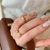 Conjunto de brincos e anel em bambu com nó banhado a ouro vietnamita, design de nicho de luxo leve de alta qualidade, simbolizando progresso contínuo, com brincos cravejados de diamantes