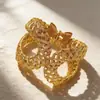 Pulseira Aberta Geométrica de Metal Transfronteiriça Europeia e Americana, Pulseira Oca Enrolada com Fio Curvo, Joia de Mão Moderna e Criativa