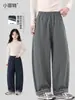 Coleção de outono 2026 para meninas Xiaofei, novo estilo, calça casual de perna curva para crianças maiores, calça xadrez da moda de perna reta com barra flare