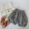 Comercio Exterior Pantalones para Niños Shorts a Cuadros para Niños Estilo Verano 2026 Bebé Pequeño Holgados Estilo Coreano Pantalones de Cinco Puntos Cuadros Blanco y Negro