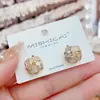 Pendientes de Lujo Ligero a la Moda con Circonitas Alrededor, Diseño Único y Estilo Elegante, Pendientes Populares para el Día a Día, Nuevos Accesorios para Orejas de Moda 2026
