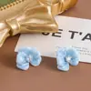 Aretes de Clip para Oreja con Esmalte Azul Goteante Flor Floreciente Zircón Disco para Mosquiteros Pendientes Elegantes de Viajero de Nicho Exquisitos y Versátiles