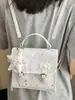 Bolso de mujer elegante Shuai Mi Jia 2026 verano nuevo bolso de hombro para ir al trabajo, a la moda, simple, de nicho, bandolera
