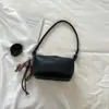 Bolso de axila de nicho de alta gama para mujer, nuevo bolso cruzado versátil casual 2026, bolso popular estilo coreano tipo almohada para el hombro