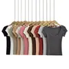 Bt811-26 Estilo Nuevo de Primavera Estilo Europeo y Americano Deseo Puro Sexy Grande Redondo Cuello Redondo Manga Corta Elástico Ajustado Delgado Camiseta
