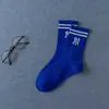 Calcetines nuevos de primavera para mujer, calcetines deportivos de hip hop callejero para patineta, algodón, dos rayas, longitud media hasta la pantorrilla, calcetines de moda con letra NY para mujer