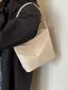 Bolsa de tela de nailon portátil estilo coreano para mujer Verano 2023 Nueva llegada de moda Bordada Bolso de axila Bolso cubo de un hombro todo a juego